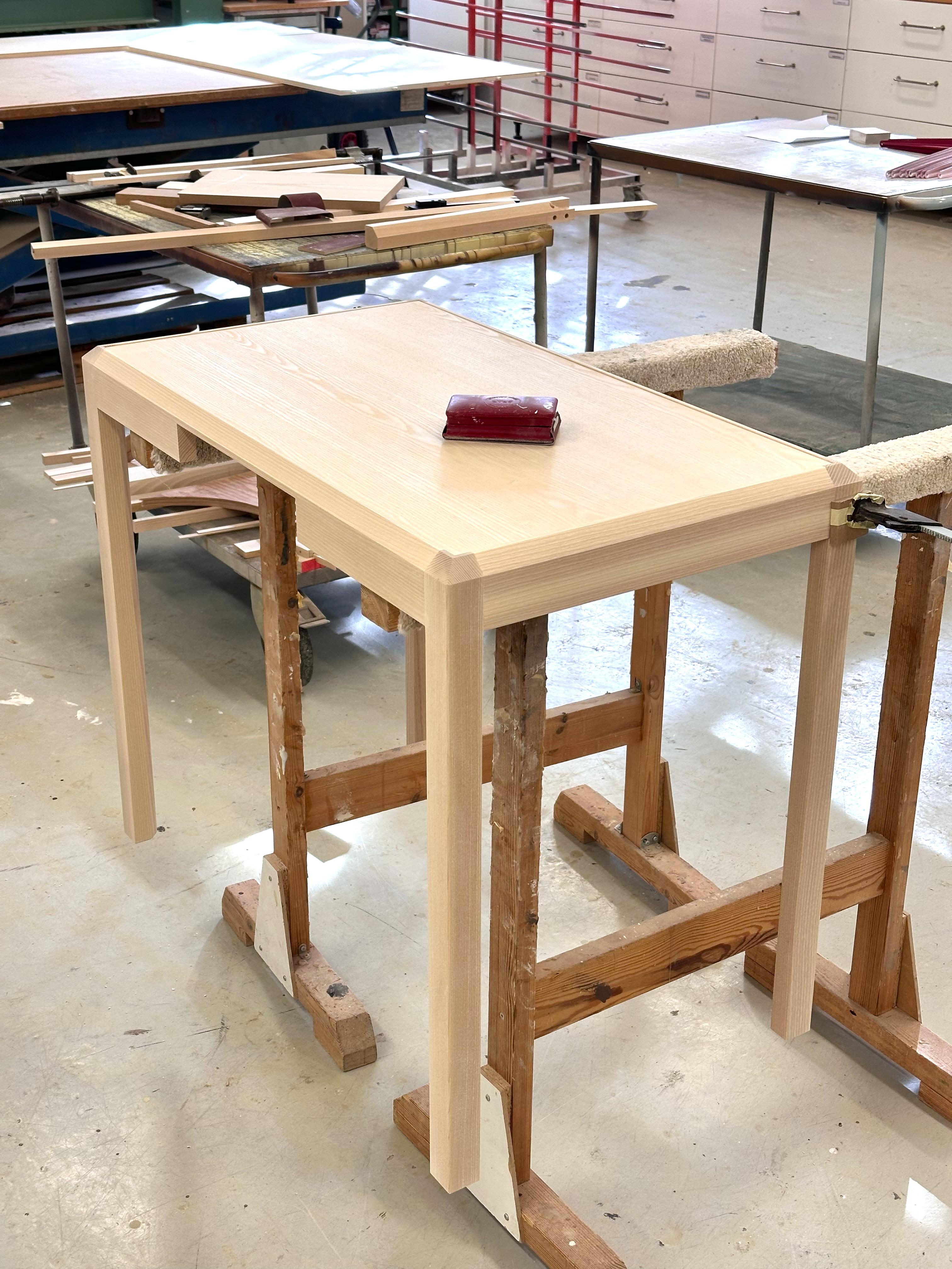 A desk under construction in the workshop